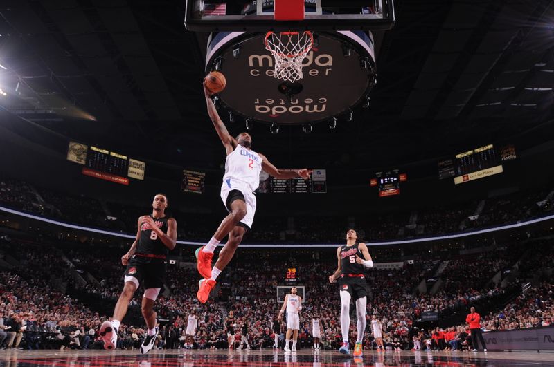 PORTLAND, OR - MARCH 20: Kawhi Leonard #2 of the LA Clippers drives to the basket during the game against the Portland Trail Blazers on March 20, 2024 at the Moda Center Arena in Portland, Oregon. NOTE TO USER: User expressly acknowledges and agrees that, by downloading and or using this photograph, user is consenting to the terms and conditions of the Getty Images License Agreement. Mandatory Copyright Notice: Copyright 2024 NBAE (Photo by Cameron Browne/NBAE via Getty Images)