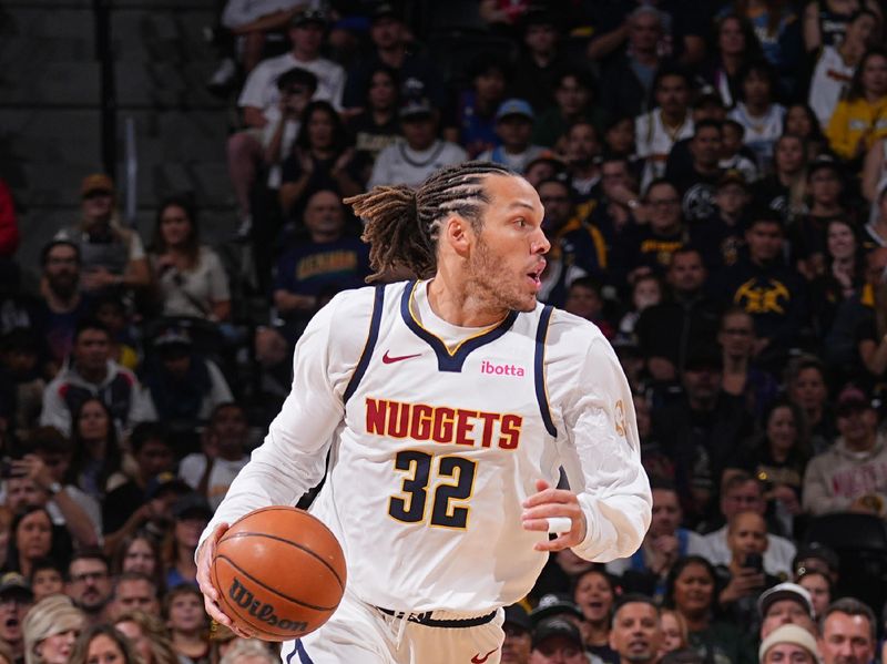 DENVER, CO - OCTOBER 13: Aaron Gordon #32 of the Denver Nuggets dribbles the ball during the game against the Phoenix Suns on October 13, 2024 at Ball Arena in Denver, Colorado. NOTE TO USER: User expressly acknowledges and agrees that, by downloading and/or using this Photograph, user is consenting to the terms and conditions of the Getty Images License Agreement. Mandatory Copyright Notice: Copyright 2024 NBAE (Photo by Bart Young/NBAE via Getty Images)