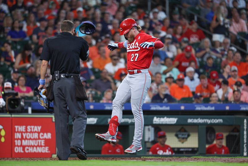 Jun 18, 2023; Houston, Texas, USA; Cincinnati Reds left fielder Jake Fraley (27) crosses home plate after hitting a home run during the second inning against the Houston Astros at Minute Maid Park. Mandatory Credit: Troy Taormina-USA TODAY Sports