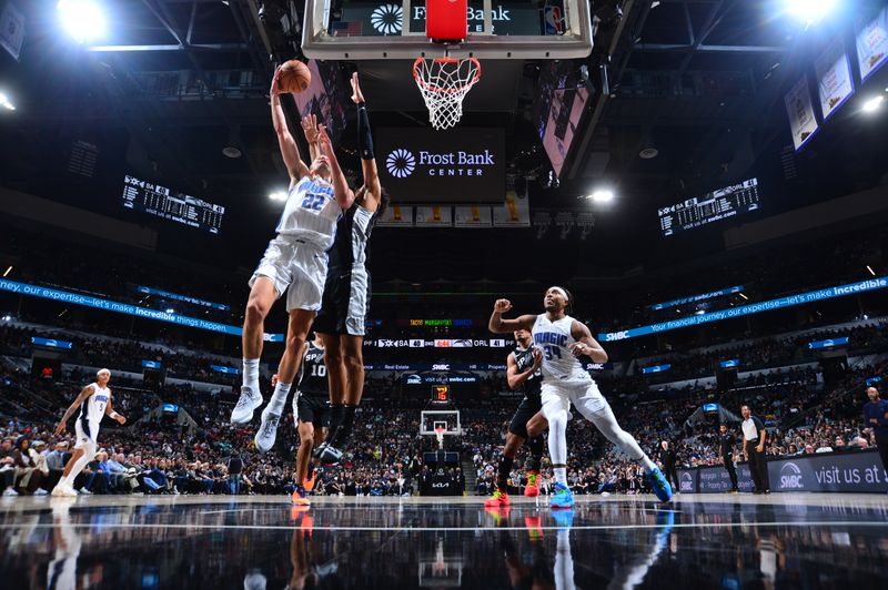 SAN ANTONIO, TX - JANUARY 31: Franz Wagner #22 of the Orlando Magic drives to the basket during the game against the San Antonio Spurs on January 31, 2024 at the Frost Bank Center in San Antonio, Texas. NOTE TO USER: User expressly acknowledges and agrees that, by downloading and or using this photograph, user is consenting to the terms and conditions of the Getty Images License Agreement. Mandatory Copyright Notice: Copyright 2024 NBAE (Photos by Michael Gonzales/NBAE via Getty Images)