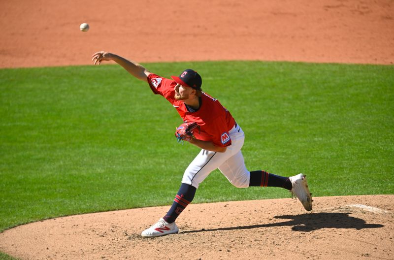 Oct 5, 2024; Cleveland, Ohio, USA; Cleveland Guardians pitcher Tanner Bibee (28) throws in the fifth inning against the Detroit Tigers in game one of the ALDS for the 2024 MLB Playoffs at Progressive Field. Mandatory Credit: David Richard-Imagn Images