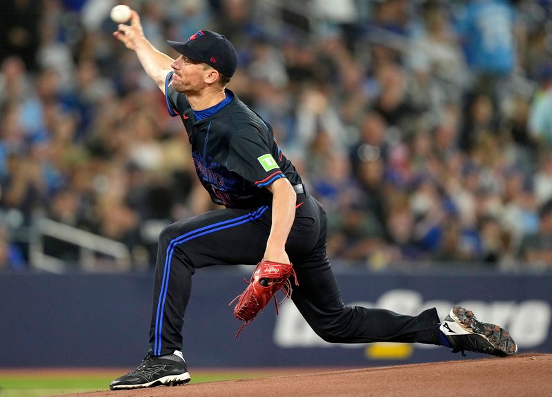 Sep 23, 2024; Toronto, Ontario, CAN; Toronto Blue Jays starting pitcher Chris Bassitt (40) pitches to the Boston Red Sox during the first inning at Rogers Centre. Mandatory Credit: John E. Sokolowski-Imagn Images