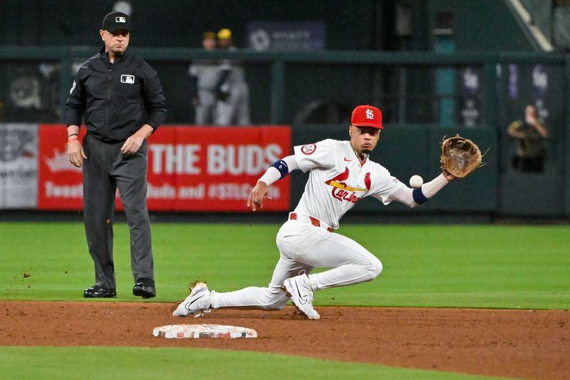 Aug 21, 2024; St. Louis, Missouri, USA;  St. Louis Cardinals shortstop Masyn Winn (0) fields a ground ball against the Milwaukee Brewers during the fifth inning at Busch Stadium. Mandatory Credit: Jeff Curry-USA TODAY Sports