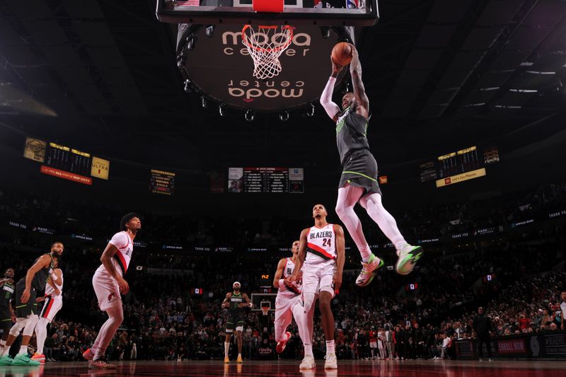 PORTLAND, OR - NOVEMBER 13: Julius Randle #30 of the Minnesota Timberwolves dunks the ball during the game against the Portland Trail Blazers on November 13, 2024 at the Moda Center Arena in Portland, Oregon. NOTE TO USER: User expressly acknowledges and agrees that, by downloading and or using this photograph, user is consenting to the terms and conditions of the Getty Images License Agreement. Mandatory Copyright Notice: Copyright 2024 NBAE (Photo by Cameron Browne/NBAE via Getty Images)