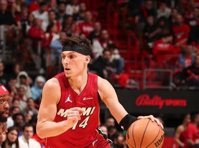 MIAMI, FL - DECEMBER 25:  Tyler Herro #14 of the Miami Heat goes to the basket during the game  on December 25, 2023 at Kaseya Center Arena in Miami, Florida. NOTE TO USER: User expressly acknowledges and agrees that, by downloading and or using this Photograph, user is consenting to the terms and conditions of the Getty Images License Agreement. Mandatory Copyright Notice: Copyright 2023 NBAE (Photo by Issac Baldizon/NBAE via Getty Images)