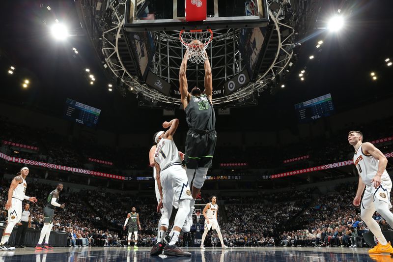 MINNEAPOLIS, MN -  NOVEMBER 1: Rudy Gobert #27 of the Minnesota Timberwolves dunks the ball during the game against the Denver Nuggets on November 1, 2024 at Target Center in Minneapolis, Minnesota. NOTE TO USER: User expressly acknowledges and agrees that, by downloading and or using this Photograph, user is consenting to the terms and conditions of the Getty Images License Agreement. Mandatory Copyright Notice: Copyright 2024 NBAE (Photo by David Sherman/NBAE via Getty Images)