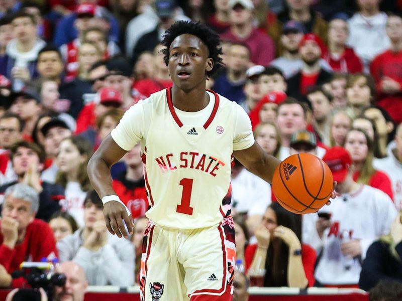 Feb 4, 2023; Raleigh, North Carolina, USA; North Carolina State Wolfpack guard Jarkel Joiner (1) dribbles the ball first half against Georgia Tech Yellow Jackets at PNC Arena. Mandatory Credit: Jaylynn Nash-USA TODAY Sports