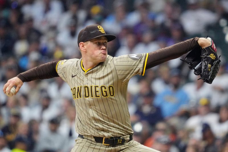 Jun 7, 2025; Milwaukee, Wisconsin, USA; San Diego Padres pitcher Stephen Kolek (32) delivers a pitch against the Milwaukee Brewers in the sixth inning at American Family Field. Mandatory Credit: Michael McLoone-Imagn Images