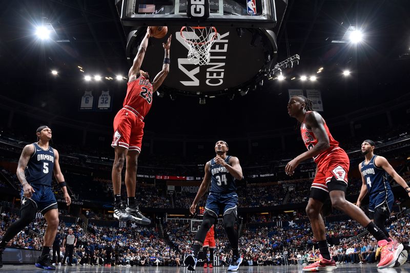 ORLANDO, FL - APRIL 7: Dalen Terry #25 of the Chicago Bulls drives to the basket during the game against the Orlando Magic on April 7, 2024 at the Kia Center in Orlando, Florida. NOTE TO USER: User expressly acknowledges and agrees that, by downloading and or using this photograph, User is consenting to the terms and conditions of the Getty Images License Agreement. Mandatory Copyright Notice: Copyright 2024 NBAE (Photo by Fernando Medina/NBAE via Getty Images)