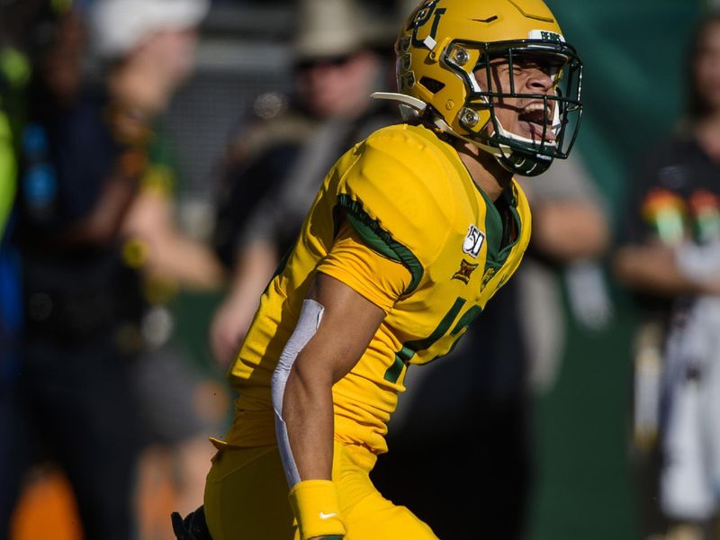 Nov 23, 2019; Waco, TX, USA; Baylor Bears cornerback Raleigh Texada (13) celebrates during the first quarter against the Texas Longhorns at McLane Stadium. Mandatory Credit: Jerome Miron-USA TODAY Sports