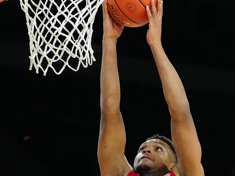 Nov 23, 2023; Las Vegas, Nevada, USA; North Carolina State Wolfpack guard Casey Morsell (14) shoots against the Vanderbilt Commodores during the second half at Michelob Ultra Arena. Mandatory Credit: Stephen R. Sylvanie-USA TODAY Sports