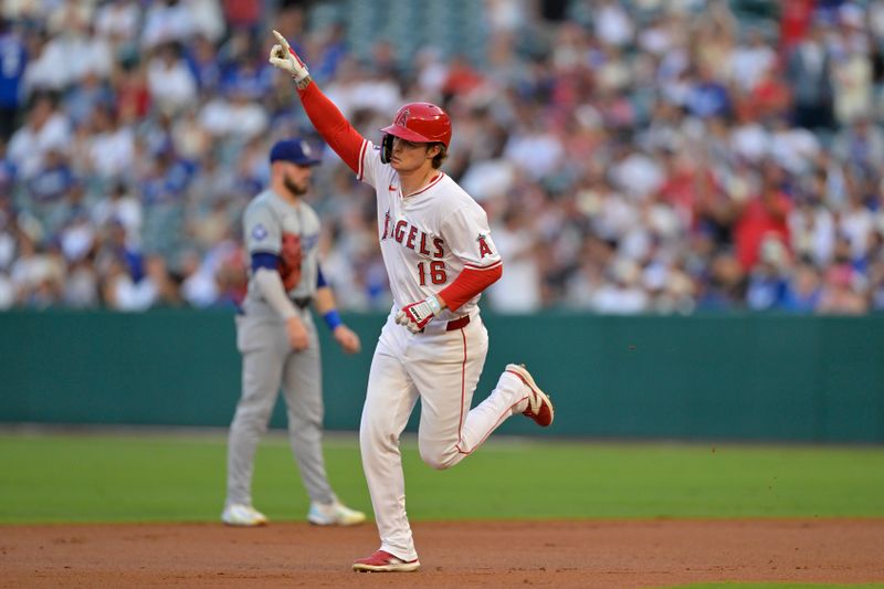 Sep 4, 2024; Anaheim, California, USA;  Los Angeles Angels center fielder Mickey Moniak (16) rounds the bases after hitting a three-run home run in the first inning against the Los Angeles Dodgers at Angel Stadium. Mandatory Credit: Jayne Kamin-Oncea-Imagn Images