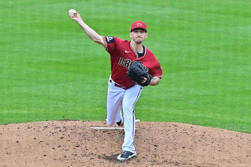 Mar 21, 2023; Salt River Pima-Maricopa, Arizona, USA; Arizona Diamondbacks starting pitcher Zach Davies (27) throws in the fourth inning against the Los Angeles Angels during a Spring Training game at Salt River Fields at Talking Stick. Mandatory Credit: Matt Kartozian-USA TODAY Sports