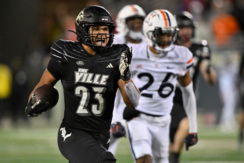 Nov 9, 2023; Louisville, Kentucky, USA; Louisville Cardinals running back Isaac Guerendo (23) runs the ball against the Virginia Cavaliers to score a touchdown during the second half at L&N Federal Credit Union Stadium. Louisville defeated Virginia 31-24. Mandatory Credit: Jamie Rhodes-USA TODAY Sports