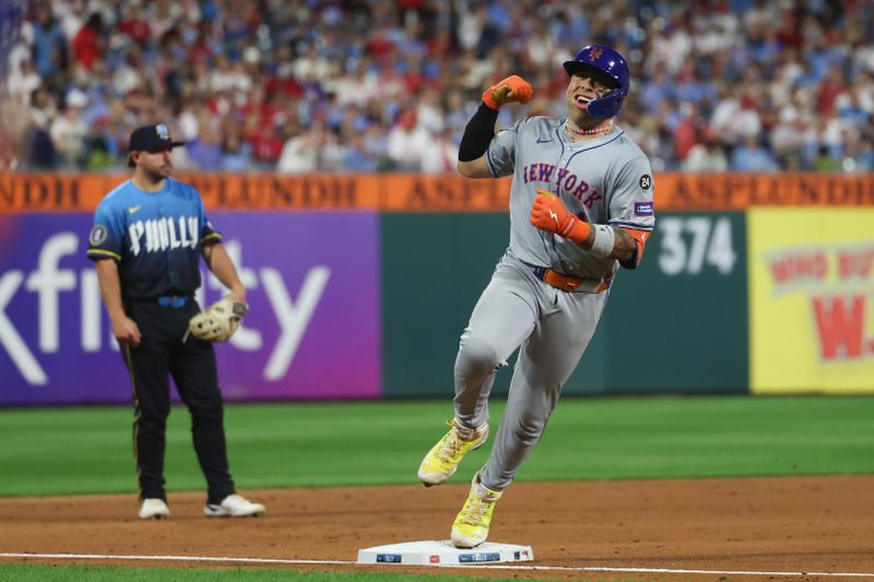 Sep 13, 2024; Philadelphia, Pennsylvania, USA; New York Mets catcher Francisco Alvarez (4) reacts as he runs the bases after hitting a three RBI home run during the fifth inning against the Philadelphia Phillies at Citizens Bank Park. Mandatory Credit: Bill Streicher-Imagn Images