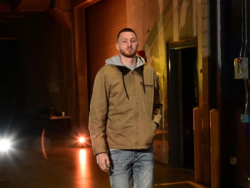 LOS ANGELES, CA - FEBRUARY 29: Dylan Windler #20 of the Los Angeles Lakers arrives to the arena before the game against the Washington Wizards on February 29, 2024 at Crypto.Com Arena in Los Angeles, California. NOTE TO USER: User expressly acknowledges and agrees that, by downloading and/or using this Photograph, user is consenting to the terms and conditions of the Getty Images License Agreement. Mandatory Copyright Notice: Copyright 2024 NBAE (Photo by Adam Pantozzi/NBAE via Getty Images)