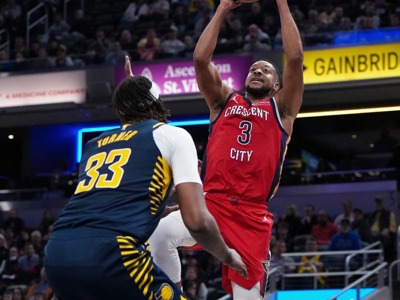 INDIANAPOLIS, INDIANA - NOVEMBER 25: CJ McCollum #3 of the New Orleans Pelicans attempts a shot while being guarded by Myles Turner #33 of the Indiana Pacers in the fourth quarter at Gainbridge Fieldhouse on November 25, 2024 in Indianapolis, Indiana. NOTE TO USER: User expressly acknowledges and agrees that, by downloading and or using this photograph, User is consenting to the terms and conditions of the Getty Images License Agreement. (Photo by Dylan Buell/Getty Images)