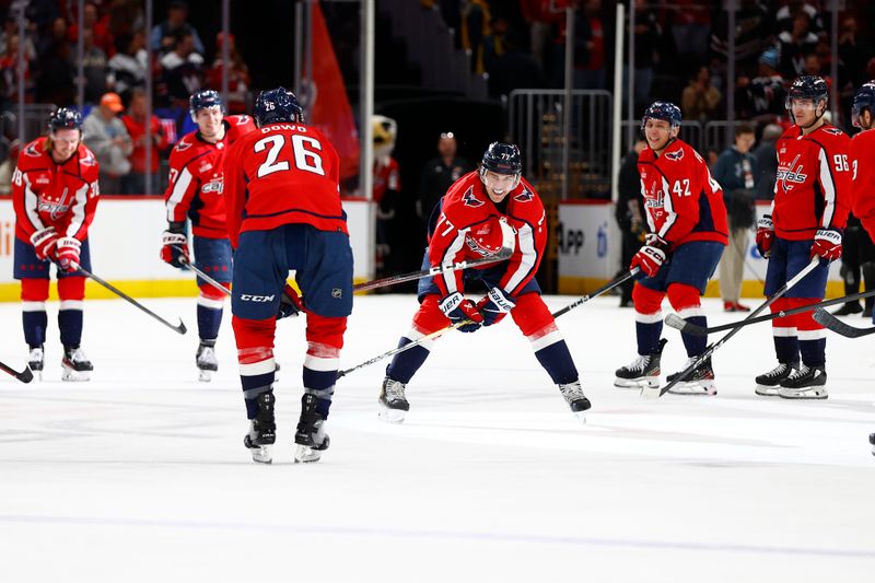 Mar 24, 2024; Washington, District of Columbia, USA; Washington Capitals right wing T.J. Oshie (77) celebrates with teammates after defeating the Winnipeg Jets at Capital One Arena. Mandatory Credit: Amber Searls-USA TODAY Sports