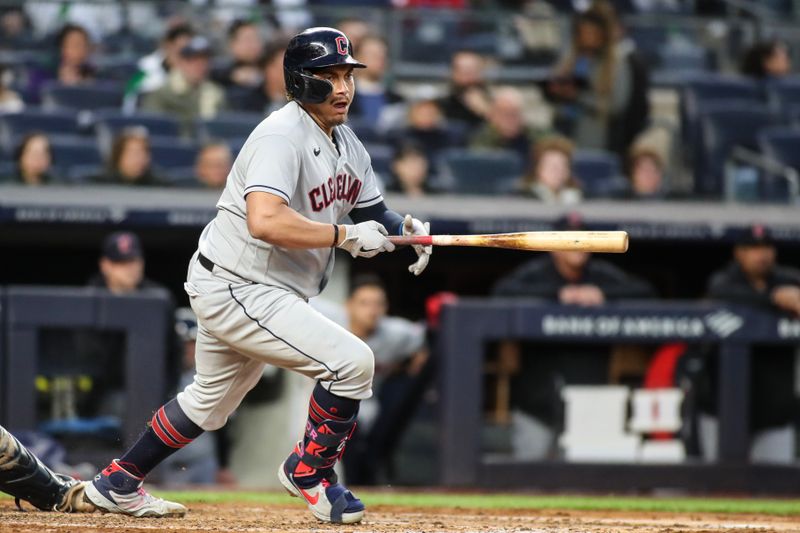 May 2, 2023; Bronx, New York, USA;  Cleveland Guardians designated hitter Josh Naylor (22) hits a RBI double in the third inning against the New York Yankees at Yankee Stadium. Mandatory Credit: Wendell Cruz-USA TODAY Sports