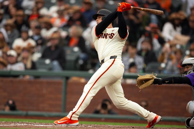 Jul 27, 2024; San Francisco, California, USA; San Francisco Giants third baseman Matt Chapman (26) follows the flight of his double against the Colorado Rockies during the eighth inning at Oracle Park. Mandatory Credit: D. Ross Cameron-USA TODAY Sports