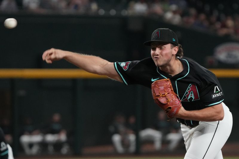 Aug 12, 2024; Phoenix, Arizona, USA; Arizona Diamondbacks pitcher Brandon Pfaadt (32) throws against the Colorado Rockies in the first inning at Chase Field. Mandatory Credit: Rick Scuteri-USA TODAY Sports