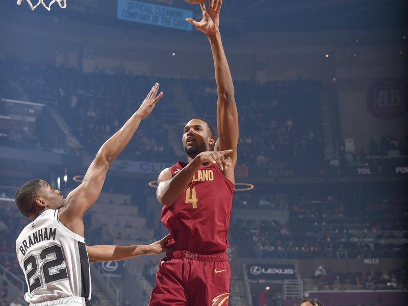 CLEVELAND, OH - FEBUARY 13:  Evan Mobley #4 of the Cleveland Cavaliers goes to the basket during the game  on Febuary 13, 2023 at Rocket Mortgage FieldHouse in Cleveland, Ohio. NOTE TO USER: User expressly acknowledges and agrees that, by downloading and/or using this Photograph, user is consenting to the terms and conditions of the Getty Images License Agreement. Mandatory Copyright Notice: Copyright 2023 NBAE (Photo by David Liam Kyle/NBAE via Getty Images)