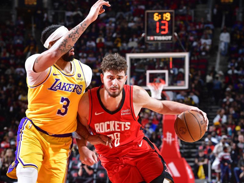 HOUSTON, TX - JANUARY 29: Alperen Sengun #28 of the Houston Rockets drives to the basket during the game against the Los Angeles Lakers  on January 29, 2024 at the Toyota Center in Houston, Texas. NOTE TO USER: User expressly acknowledges and agrees that, by downloading and or using this photograph, User is consenting to the terms and conditions of the Getty Images License Agreement. Mandatory Copyright Notice: Copyright 2024 NBAE (Photo by Logan Riely/NBAE via Getty Images)