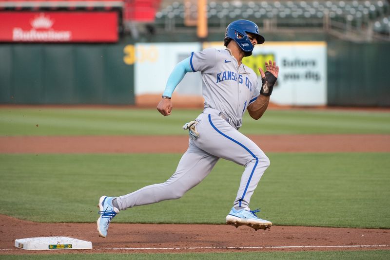 Aug 22, 2023; Oakland, California, USA; Kansas City Royals designated hitter MJ Melendez (1) rounds third base on his way to score during the second inning against the Oakland Athletics at Oakland-Alameda County Coliseum. Mandatory Credit: Ed Szczepanski-USA TODAY Sports