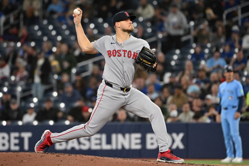 May 1, 2025; Toronto, Ontario, CAN;  Boston Red Sox starting pitcher Lucas Giolito (54) delivers a pitch against the Toronto Blue Jays in the first inning at Rogers Centre. Mandatory Credit: Dan Hamilton-Imagn Images