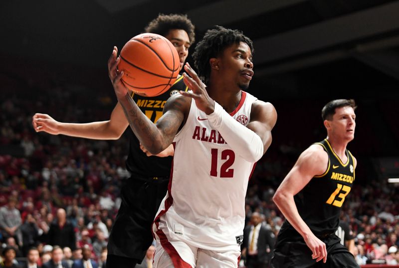 Jan 16, 2024; Tuscaloosa, Alabama, USA; Alabama guard Latrell Wrightsell Jr. (12) looks to pass in the game against Missouri at Coleman Coliseum. Mandatory Credit: Gary Cosby Jr.-USA TODAY Sports