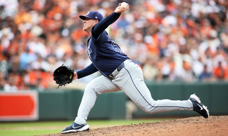 Jun 2, 2024; Baltimore, Maryland, USA; Tampa Bay Rays pitcher Garrett Cleavinger (60) throws during the eighth inning against the Baltimore Orioles at Oriole Park at Camden Yards. Mandatory Credit: Daniel Kucin Jr.-USA TODAY Sports