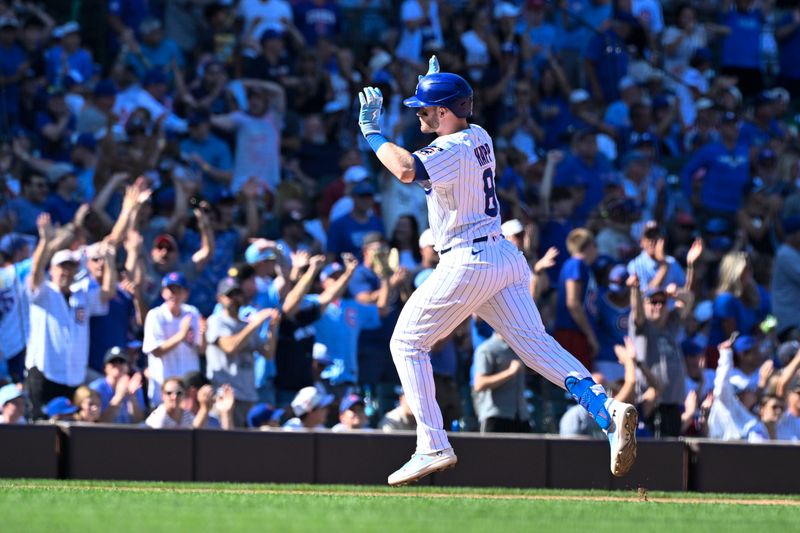Sep 14, 2025; Chicago, Illinois, USA;  Chicago Cubs outfielder Ian Happ (8) pumps his hands after hitting a home run against the Tampa Bay Rays during the sixth inning at Wrigley Field. Mandatory Credit: Matt Marton-Imagn Images