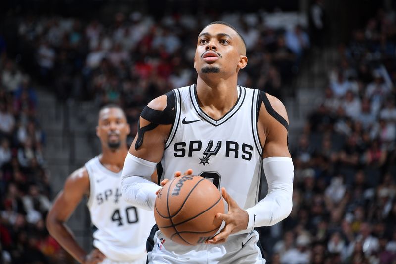 SAN ANTONIO, TX - OCTOBER 26: Keldon Johnson #0 of the San Antonio Spurs prepares to shoot a free throw during the game against the Houston Rockets on October 26, 2024 at the Frost Bank Center in San Antonio, Texas. NOTE TO USER: User expressly acknowledges and agrees that, by downloading and or using this photograph, user is consenting to the terms and conditions of the Getty Images License Agreement. Mandatory Copyright Notice: Copyright 2024 NBAE (Photos by Michael Gonzales/NBAE via Getty Images)