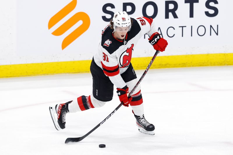 Apr 2, 2023; Winnipeg, Manitoba, CAN; New Jersey Devils center Dawson Mercer (91) warms up before a game against the Winnipeg Jets at Canada Life Centre. Mandatory Credit: James Carey Lauder-USA TODAY Sports