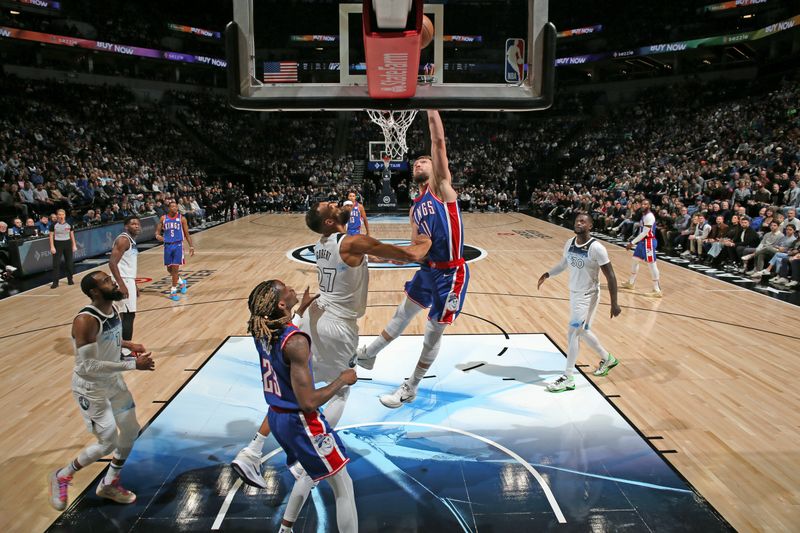 MINNEAPOLIS, MN -  NOVEMBER 27: Domantas Sabonis #11 of the Sacramento Kings dunks the ball during the game against the Minnesota Timberwolves on November 27, 2024 at Target Center in Minneapolis, Minnesota. NOTE TO USER: User expressly acknowledges and agrees that, by downloading and or using this Photograph, user is consenting to the terms and conditions of the Getty Images License Agreement. Mandatory Copyright Notice: Copyright 2024 NBAE (Photo by David Sherman/NBAE via Getty Images)