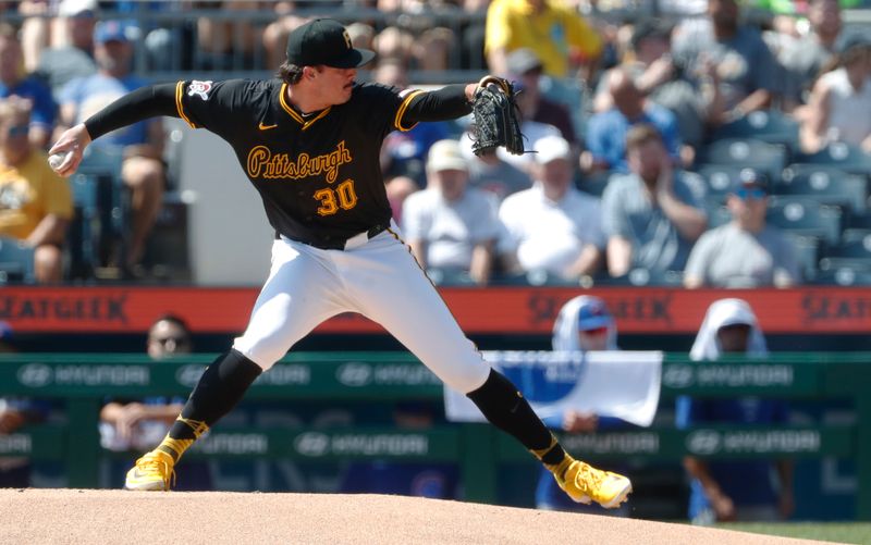 Aug 28, 2024; Pittsburgh, Pennsylvania, USA;  Pittsburgh Pirates starting pitcher Paul Skenes (30) delivers a pitch against the Chicago Cubs during the first inning at PNC Park. Mandatory Credit: Charles LeClaire-USA TODAY Sports