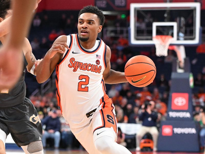 Jan 7, 2025; Syracuse, New York, USA; Syracuse Orange guard J.J. Starling (2) drives the ball to the basket in the second half against the Georgia Tech Yellow Jackets at the JMA Wireless Dome. Mandatory Credit: Mark Konezny-Imagn Images
