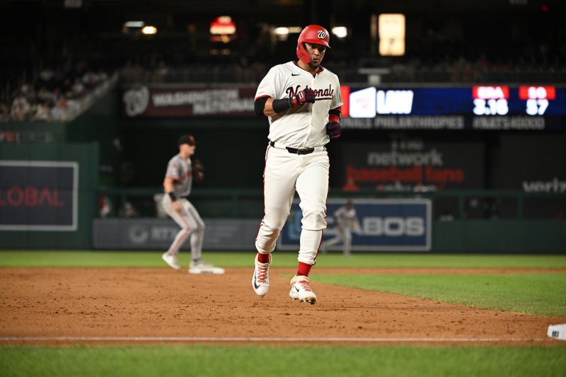 Aug 6, 2024; Washington, District of Columbia, USA; Washington Nationals second baseman Ildemaro Vargas (14) runs to third base against the San Francisco Giants during the fifth inning at Nationals Park. Mandatory Credit: Rafael Suanes-USA TODAY Sports