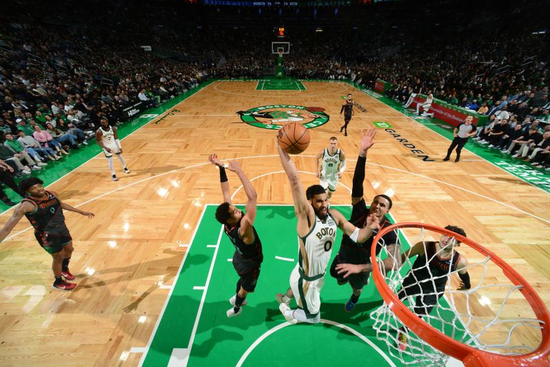 BOSTON, MA - FEBRUARY 9: Jayson Tatum #0 of the Boston Celtics drives to the basket during the game against the Washington Wizards on February 9, 2024 at the TD Garden in Boston, Massachusetts. NOTE TO USER: User expressly acknowledges and agrees that, by downloading and or using this photograph, User is consenting to the terms and conditions of the Getty Images License Agreement. Mandatory Copyright Notice: Copyright 2024 NBAE  (Photo by Brian Babineau/NBAE via Getty Images)