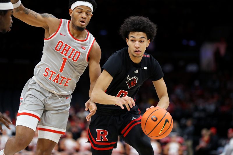 Jan 3, 2024; Columbus, Ohio, USA; Rutgers Scarlet Knights guard Derek Simpson (0) dribbles the ball as Ohio State Buckeyes guard Roddy Gayle Jr. (1) defends during the first half at Value City Arena. Mandatory Credit: Joseph Maiorana-USA TODAY Sports