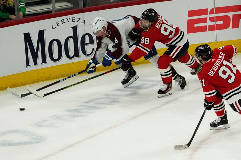 Feb 29, 2024; Chicago, Illinois, USA; Colorado Avalanche defenseman Cale Makar (8) defends Chicago Blackhawks center Connor Bedard (98) during the first period at United Center. Mandatory Credit: David Banks-USA TODAY Sports