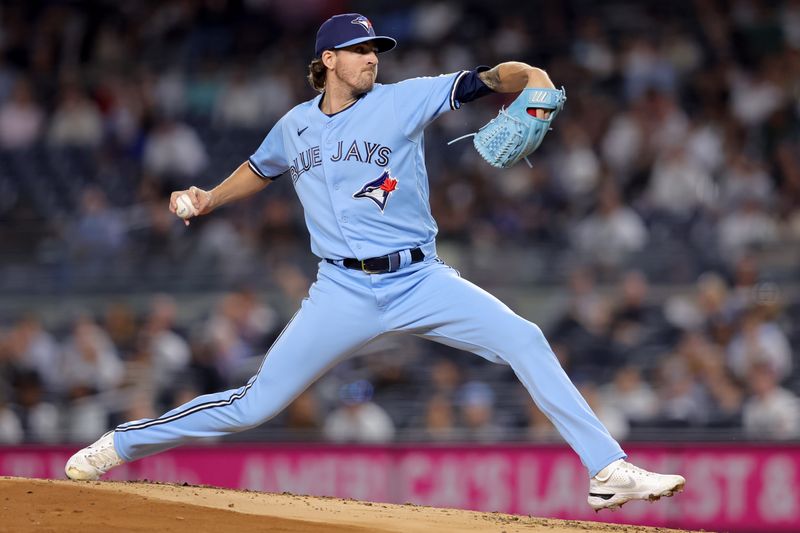 Sep 20, 2023; Bronx, New York, USA; Toronto Blue Jays starting pitcher Kevin Gausman (34) pitches against the New York Yankees during the first inning at Yankee Stadium. Mandatory Credit: Brad Penner-USA TODAY Sports