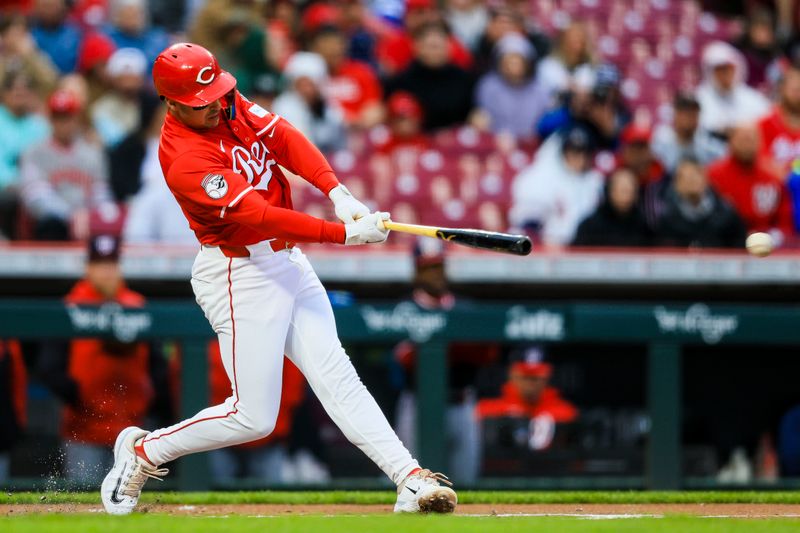 May 3, 2025; Cincinnati, Ohio, USA; Cincinnati Reds first baseman Spencer Steer (7) hits a two-run double in the first inning against the Washington Nationals at Great American Ball Park. Mandatory Credit: Katie Stratman-Imagn Images