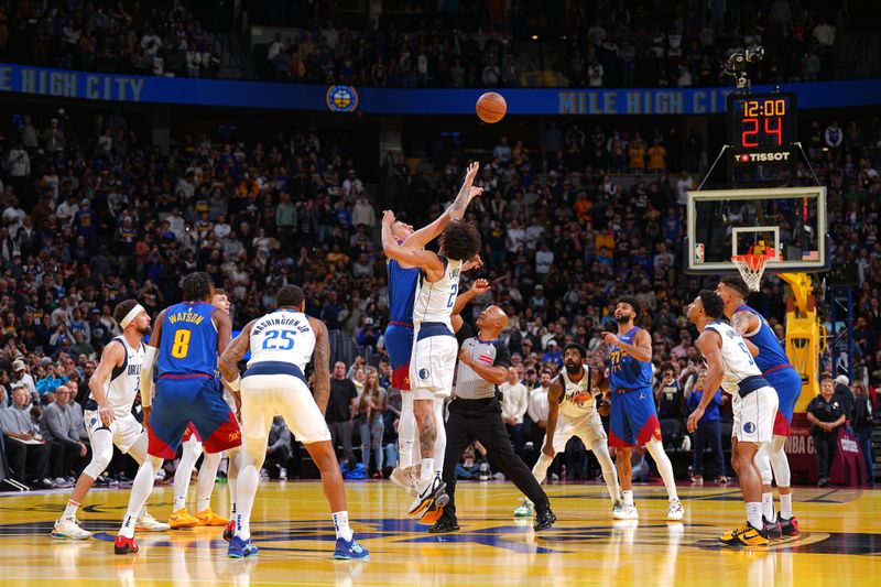 DENVER, CO - NOVEMBER 22: Nikola Jokic #15 of the Denver Nuggets and Dereck Lively II #2 of the Dallas Mavericks go for the opening tip-off during the game during the Emirates NBA Cup game on November 22, 2024 at Ball Arena in Denver, Colorado. NOTE TO USER: User expressly acknowledges and agrees that, by downloading and/or using this Photograph, user is consenting to the terms and conditions of the Getty Images License Agreement. Mandatory Copyright Notice: Copyright 2024 NBAE (Photo by Garrett Ellwood/NBAE via Getty Images)