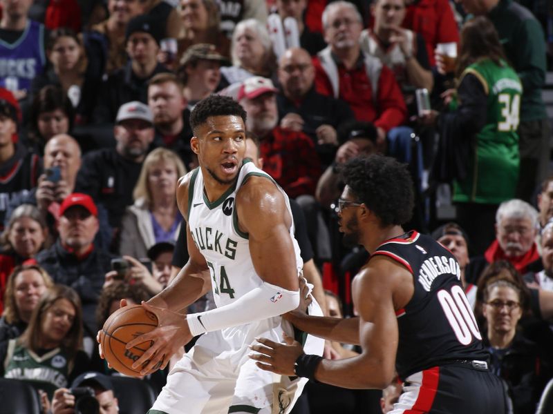 PORTLAND, OR - JANUARY 31:  Giannis Antetokounmpo #34 of the Milwaukee Bucks handles the ball during the game  on January 31, 2024 at the Moda Center Arena in Portland, Oregon. NOTE TO USER: User expressly acknowledges and agrees that, by downloading and or using this photograph, user is consenting to the terms and conditions of the Getty Images License Agreement. Mandatory Copyright Notice: Copyright 2024 NBAE (Photo by Cameron Browne/NBAE via Getty Images)