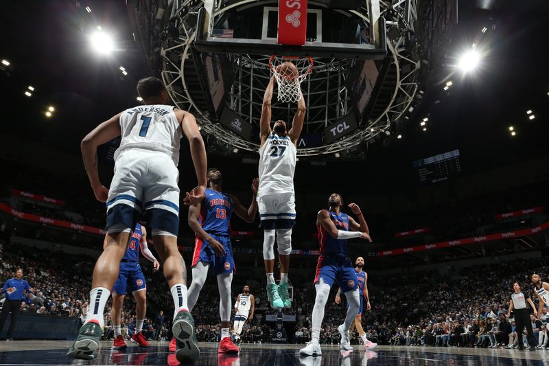 MINNEAPOLIS, MN -  MARCH 27: Rudy Gobert #27 of the Minnesota Timberwolves drives to the basket during the game against the Detroit Pistons on March 27, 2024 at Target Center in Minneapolis, Minnesota. NOTE TO USER: User expressly acknowledges and agrees that, by downloading and or using this Photograph, user is consenting to the terms and conditions of the Getty Images License Agreement. Mandatory Copyright Notice: Copyright 2024 NBAE (Photo by David Sherman/NBAE via Getty Images)