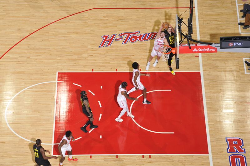 HOUSTON, TX - JANUARY 20: Alperen Sengun #28 of the Houston Rockets and Lauri Markkanen #23 of the Utah Jazz waits for a rebound during the game on January 20, 2024 at the Toyota Center in Houston, Texas. NOTE TO USER: User expressly acknowledges and agrees that, by downloading and or using this photograph, User is consenting to the terms and conditions of the Getty Images License Agreement. Mandatory Copyright Notice: Copyright 2024 NBAE (Photo by Logan Riely/NBAE via Getty Images)