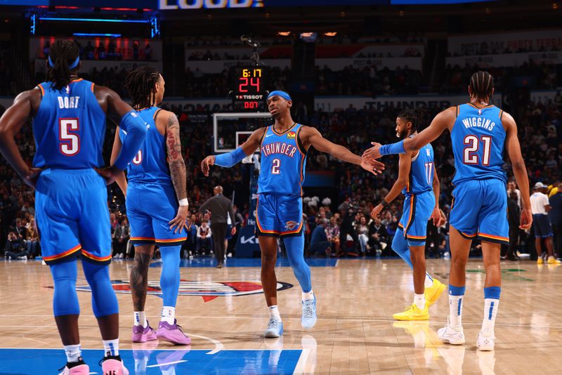 OKLAHOMA CITY, OK - MARCH 8:  Shai Gilgeous-Alexander #2 of the Oklahoma City Thunder is congratulated during the game against the Miami Heat on March 8, 2024 at Paycom Arena in Oklahoma City, Oklahoma. NOTE TO USER: User expressly acknowledges and agrees that, by downloading and or using this photograph, User is consenting to the terms and conditions of the Getty Images License Agreement. Mandatory Copyright Notice: Copyright 2024 NBAE (Photo by Zach Beeker/NBAE via Getty Images)