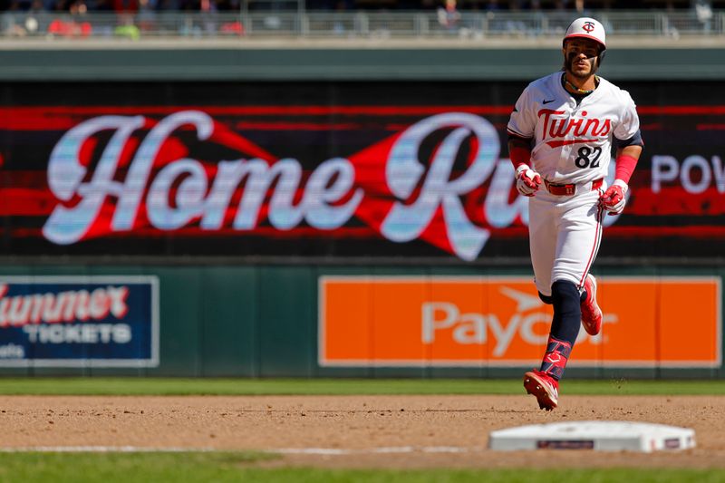 Apr 21, 2024; Minneapolis, Minnesota, USA; Minnesota Twins left fielder Austin Martin (82) runs the bases on his solo home run against the Detroit Tigers in the ninth inning at Target Field. Mandatory Credit: Bruce Kluckhohn-USA TODAY Sports