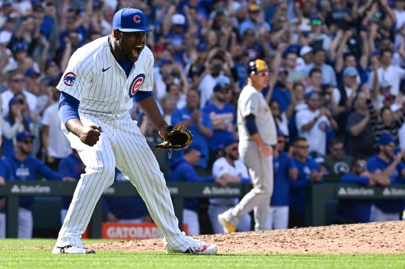 May 4, 2024; Chicago, Illinois, USA; Chicago Cubs pitcher Héctor Neris (51) reacts after beating the Milwaukee Brewers  at Wrigley Field. Mandatory Credit: Matt Marton-USA TODAY Sports